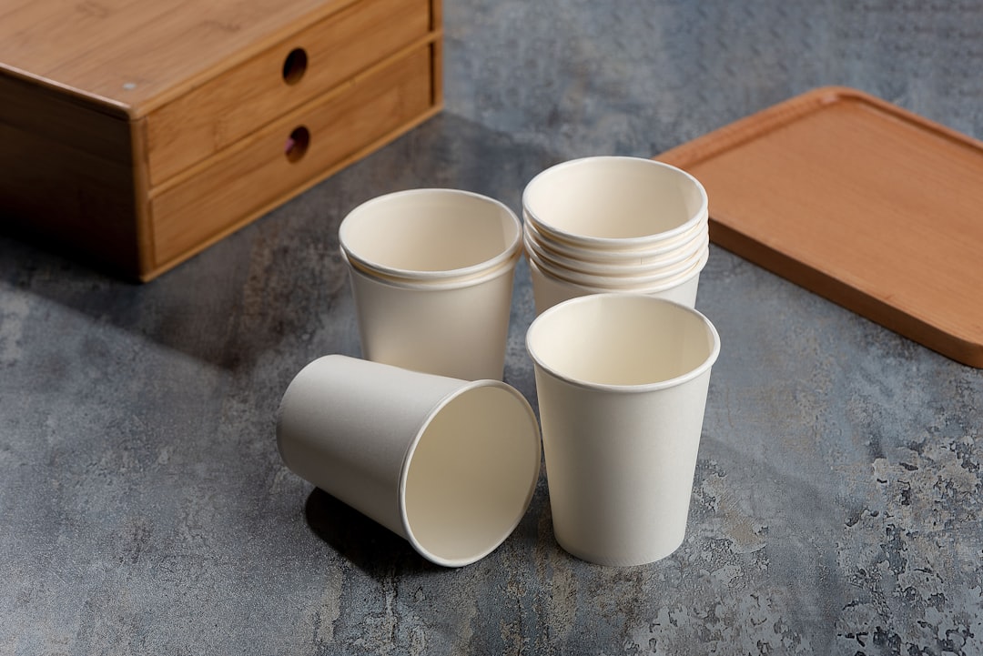 Paper cups photo by Archer Fu